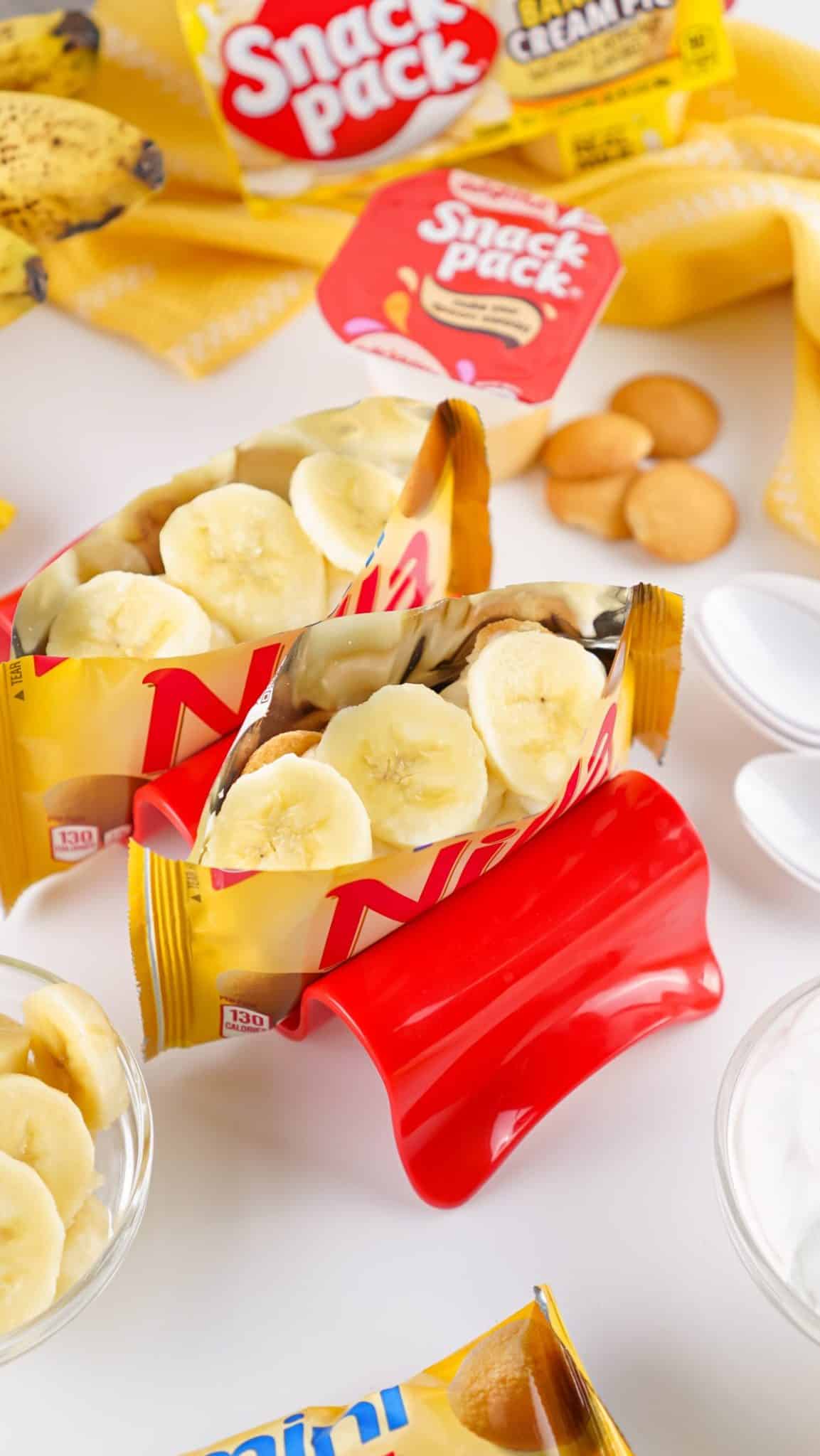 walking banana pudding desserts in a plastic stand