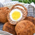 air fryer scotch eggs in a cloth lined straw basket