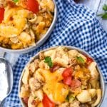 bacon cheeseburger mac and cheese in two small gray bowls