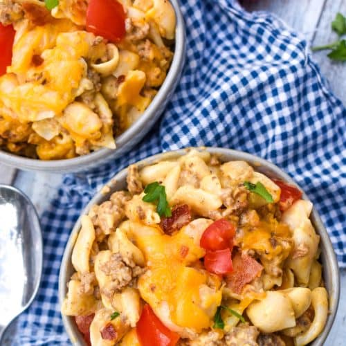 bacon cheeseburger mac and cheese in two small gray bowls