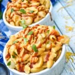 barbecue chicken mac and cheese in two small white ramekins
