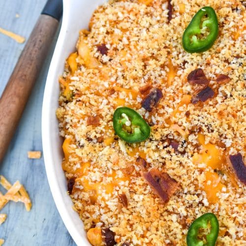 jalapeno popper mac and cheese in a large white serving bowl
