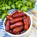 slow cooker little smokies in a small white bowl
