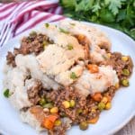 slow cooker shepherds pie served on a white dinner plate