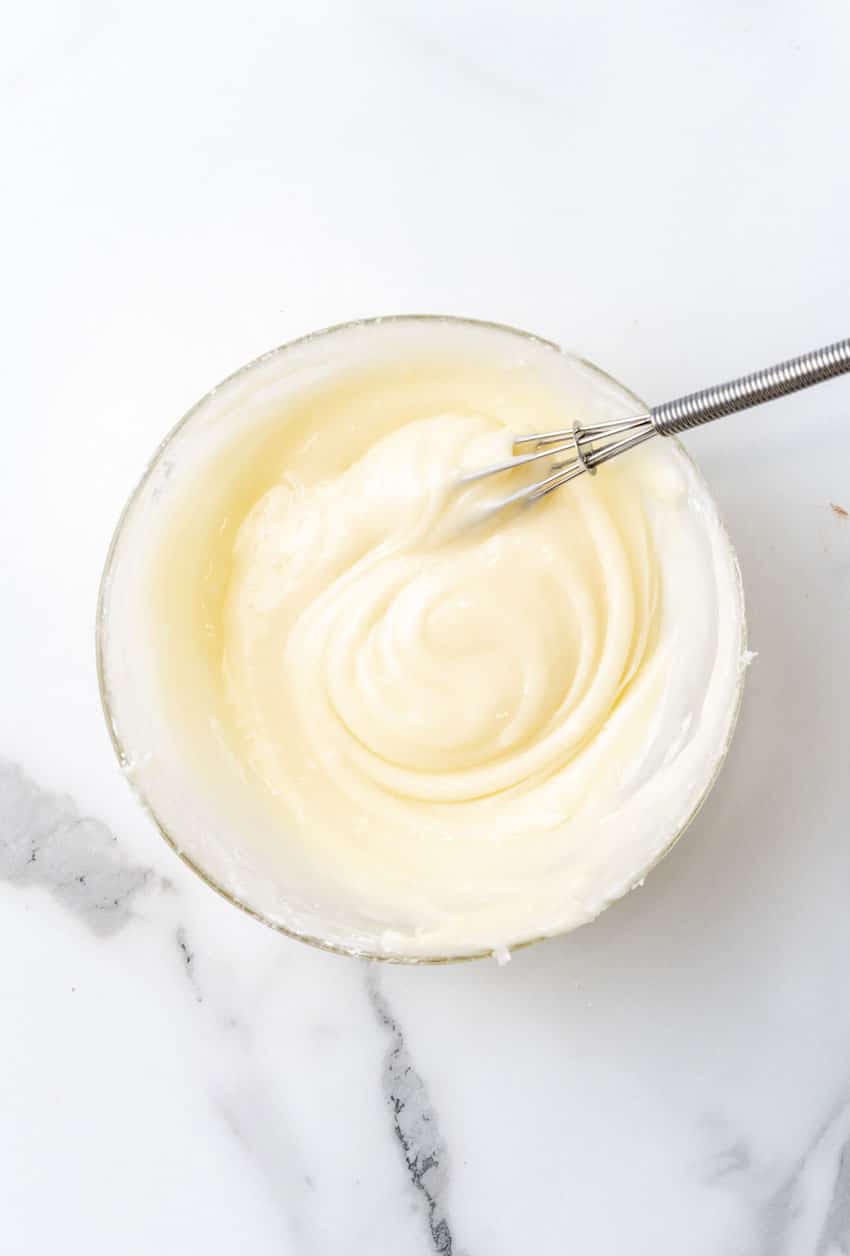 homemade pancake batter in a glass mixing bowl