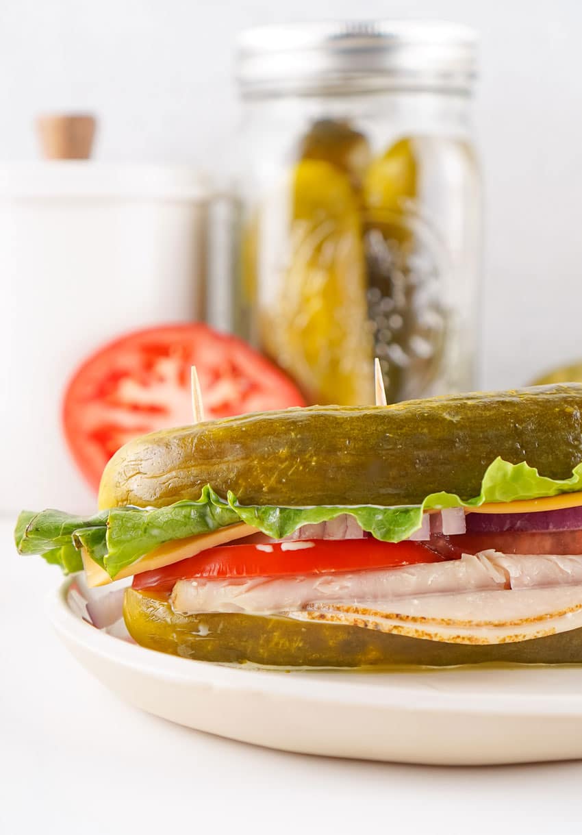 a picklewich sandwich on a white plate