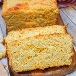 slices of easy cheese bread on a wooden cutting board