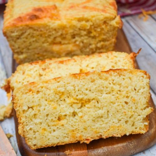 slices of easy cheese bread on a wooden cutting board