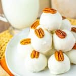 a stack of pecan pie truffles on a white plate
