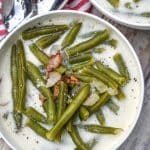 green bean soup in two small white bowls