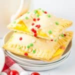 two homemade mcdonald's holiday pies stacked on a small white plate