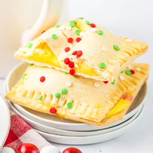 two homemade mcdonald's holiday pies stacked on a small white plate