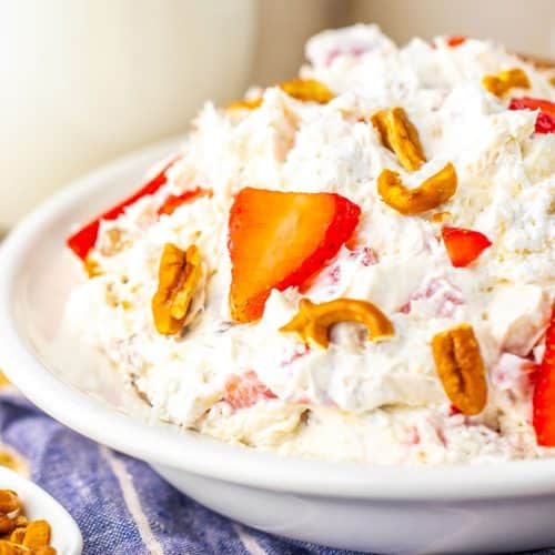 strawberry pretzel fluff salad in a white bowl