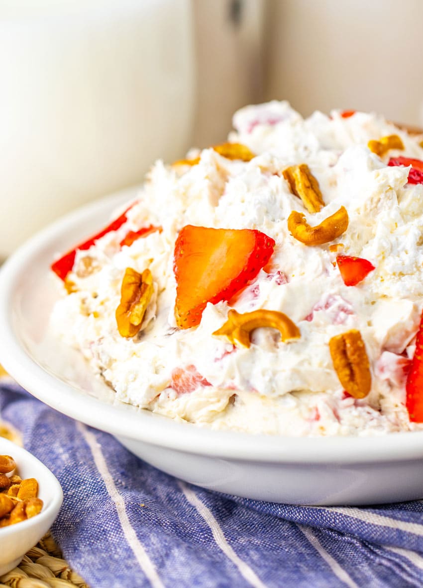 strawberry pretzel fluff salad in a white bowl