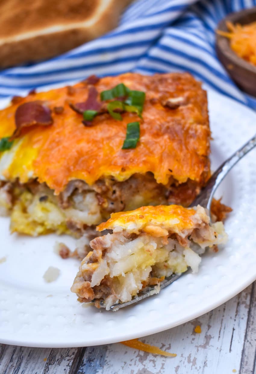 a slice of loaded hashbrown casserole on a small white plate
