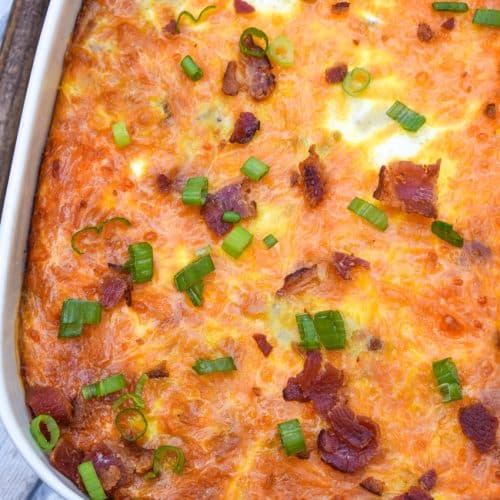 loaded hashbrown casserole in a white baking dish