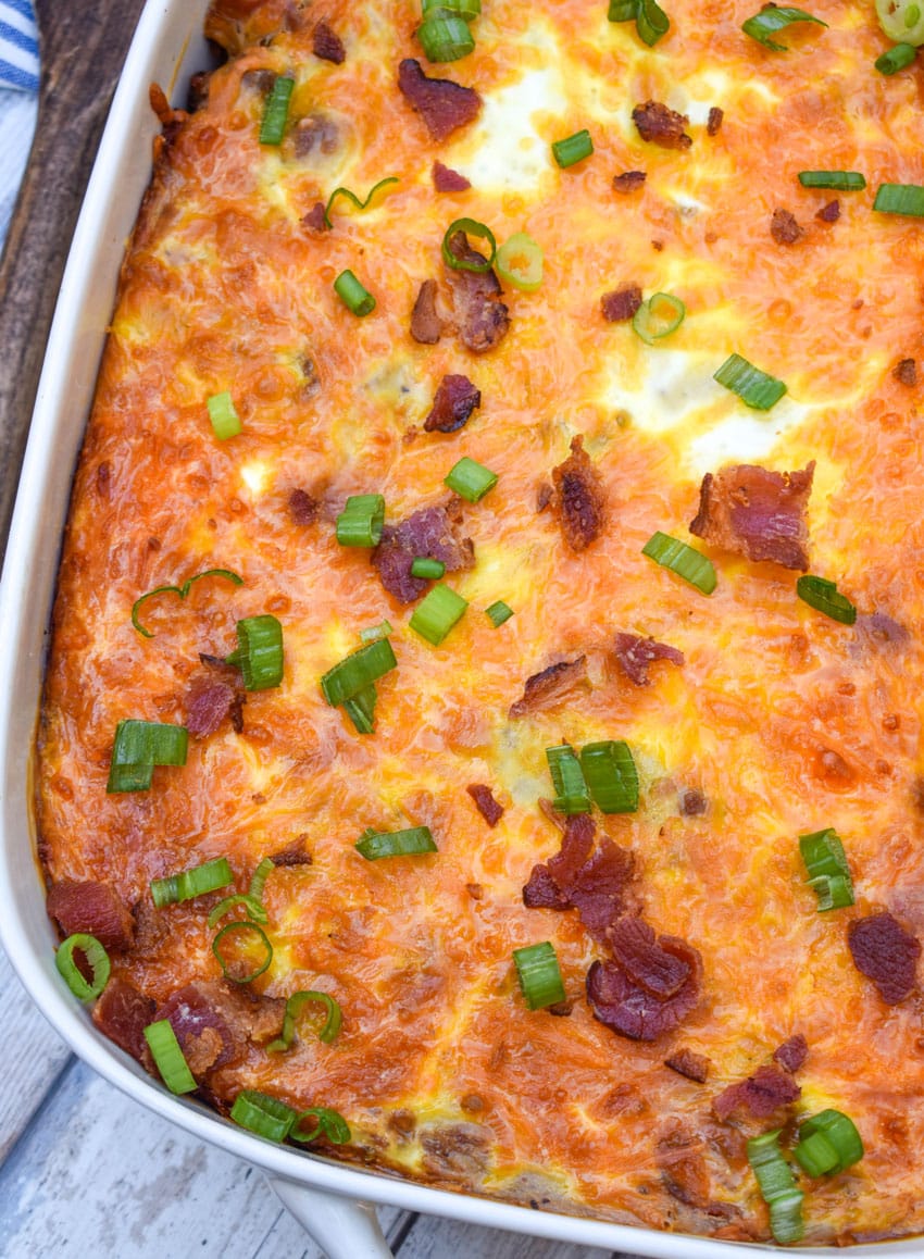 loaded hashbrown casserole in a white baking dish