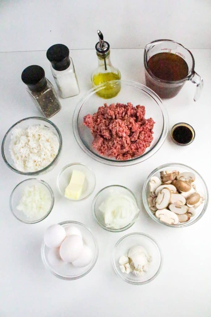 an overhead image showing the measured ingredients needed to make hawaiian loco moco
