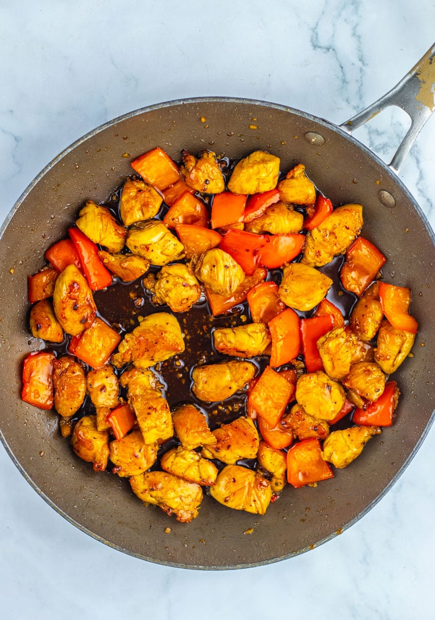 HONEY PEPPER CHICKEN IN A LARGE BLACK SKILLET