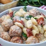 slow cooker marry me meatballs with gnocchi in a shallow white bowl