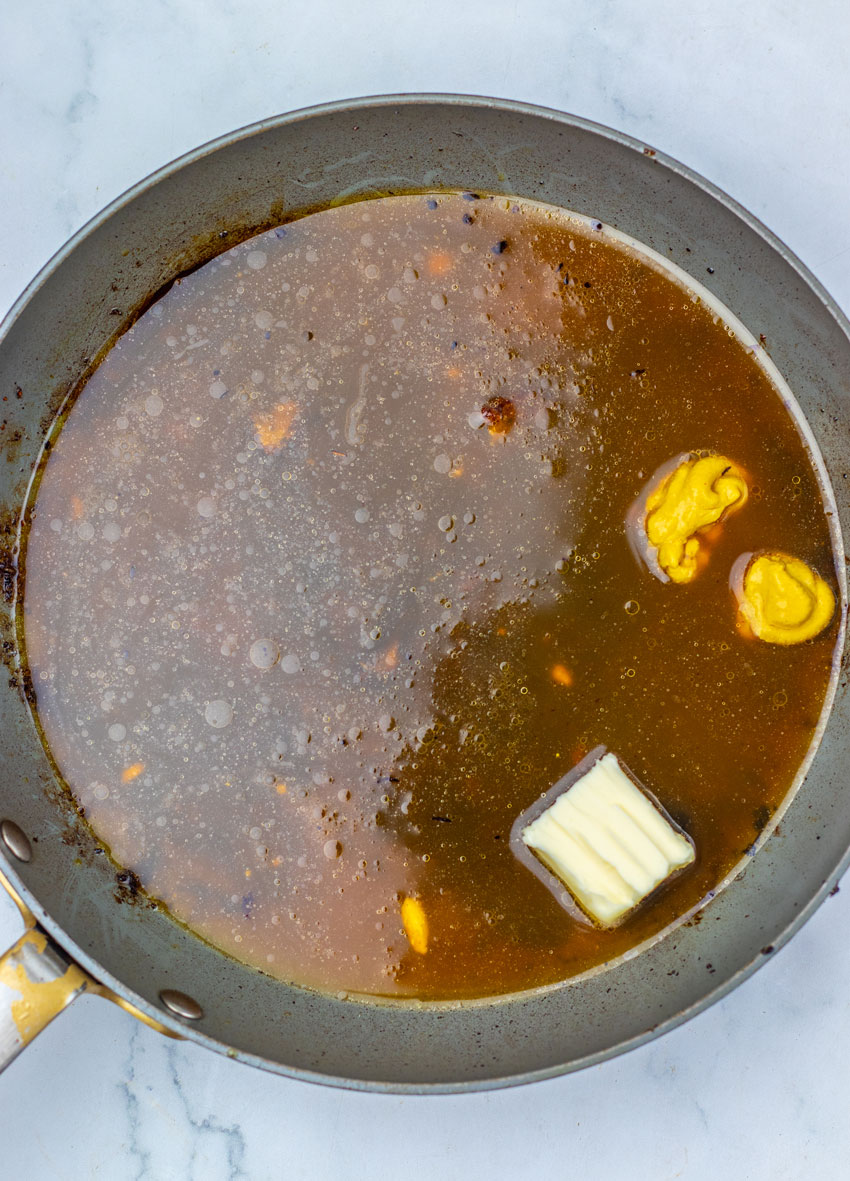 apple cider gravy in a large black skillet