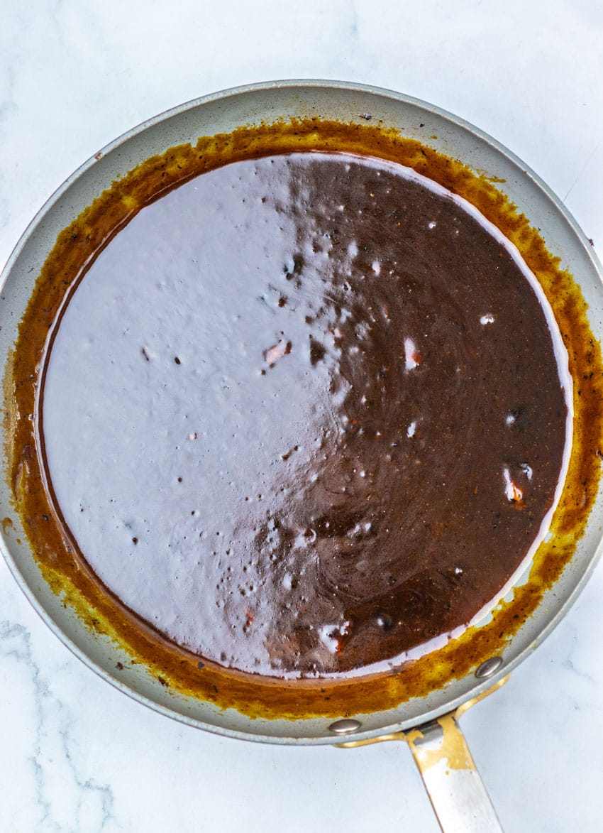 apple cider gravy in a large black skillet