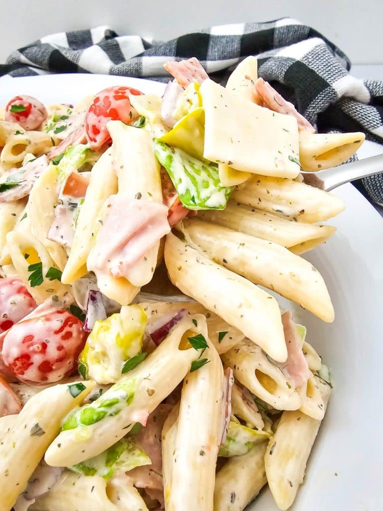 Italian hoagie pasta salad in a white serving bowl