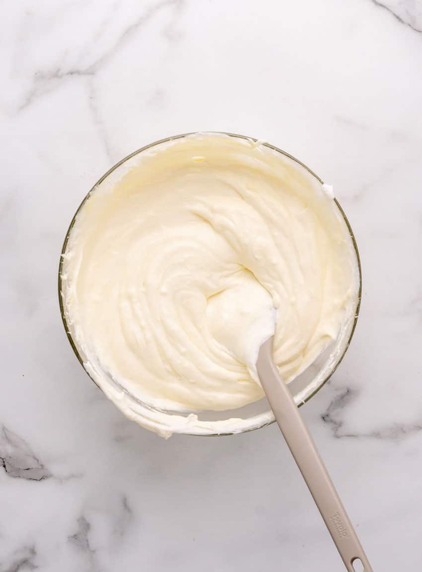 banana cream pie filling in a glass mixing bowl