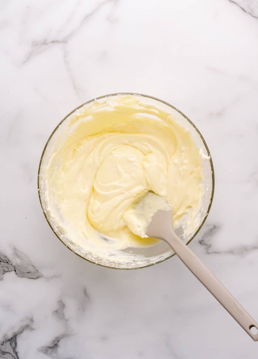 banana cream pie filling in a glass mixing bowl