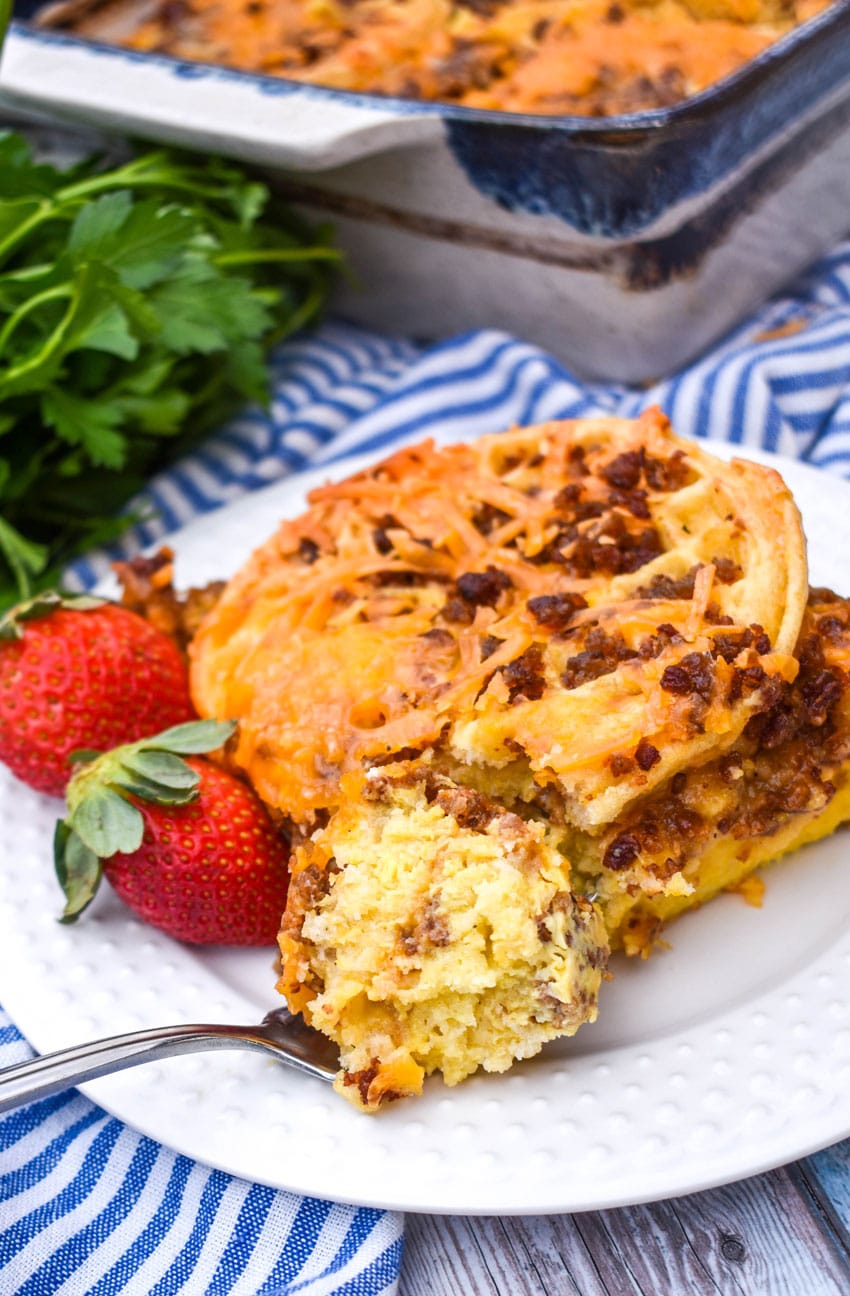 a slice of frozen waffle bread pudding on a small white plate