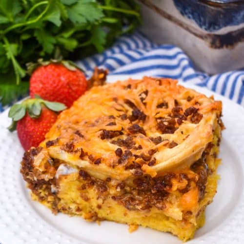 a slice of frozen waffle bread pudding on a small white plate