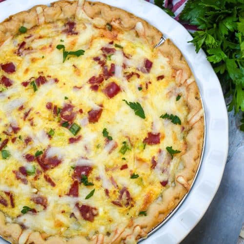 a baked reuben quiche in a white pie plate