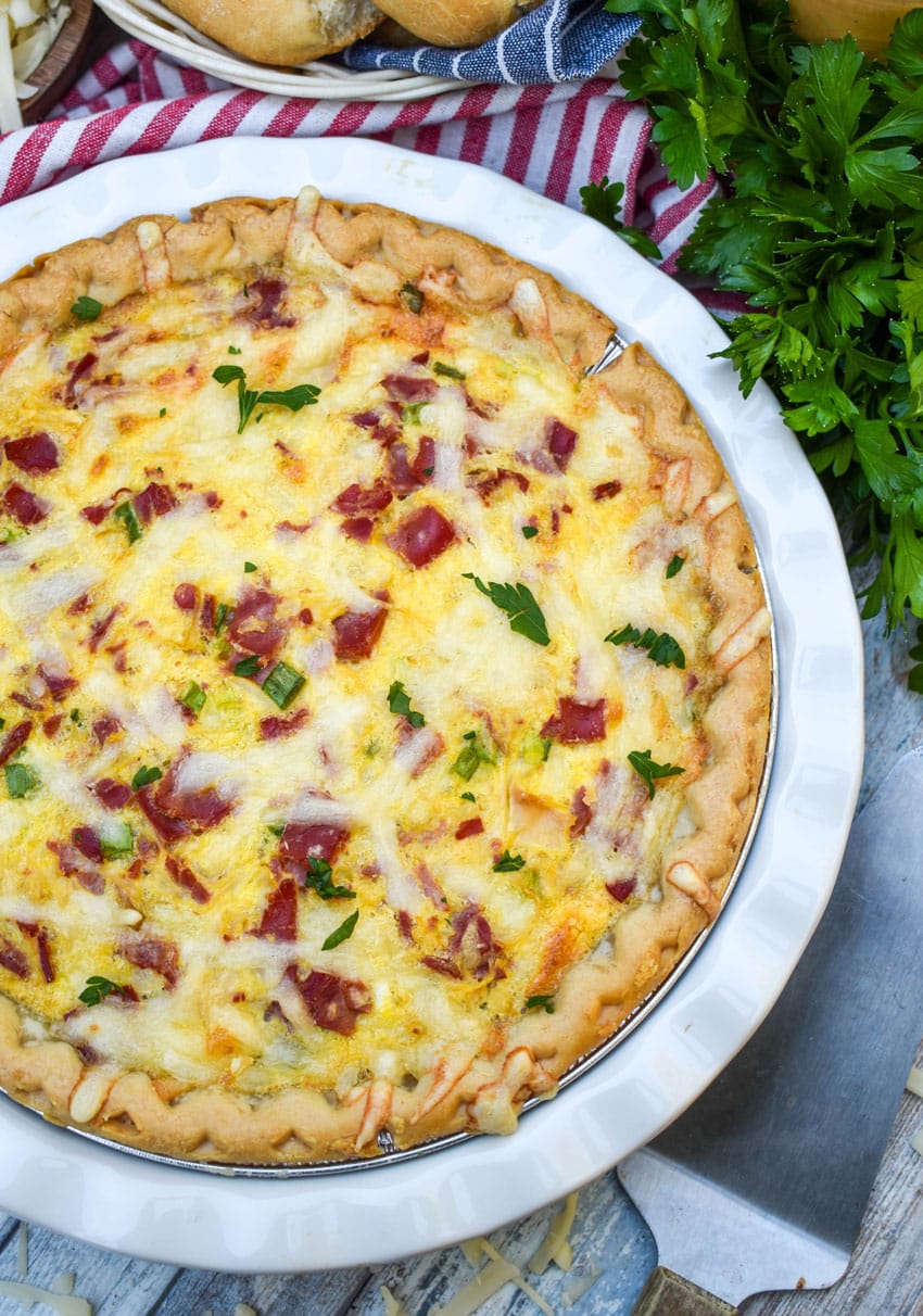 a baked reuben quiche in a white pie plate