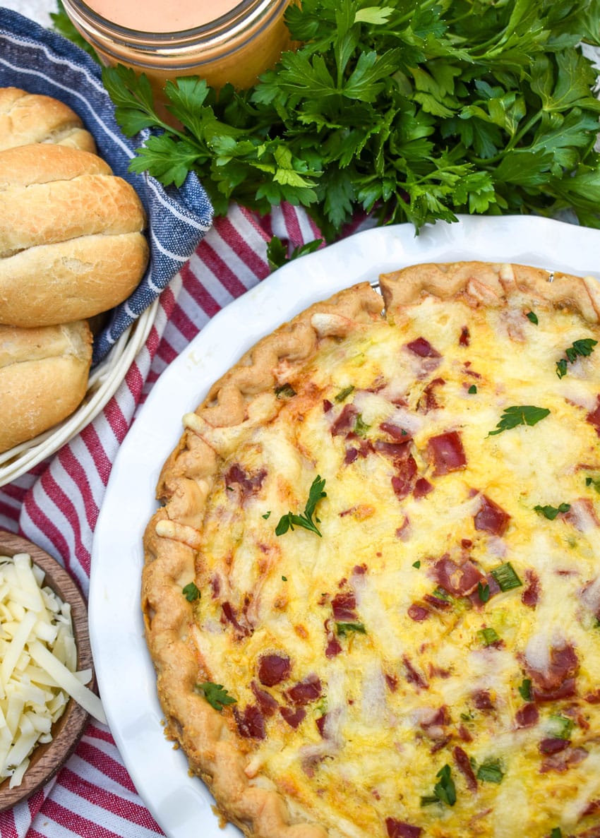 a baked reuben quiche in a white pie plate