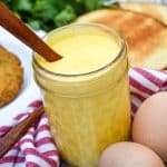 blender hollandaise sauce in a small glass mason jar