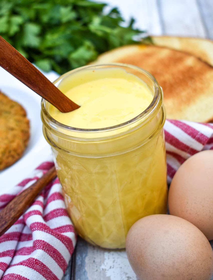 blender hollandaise sauce in a small glass mason jar