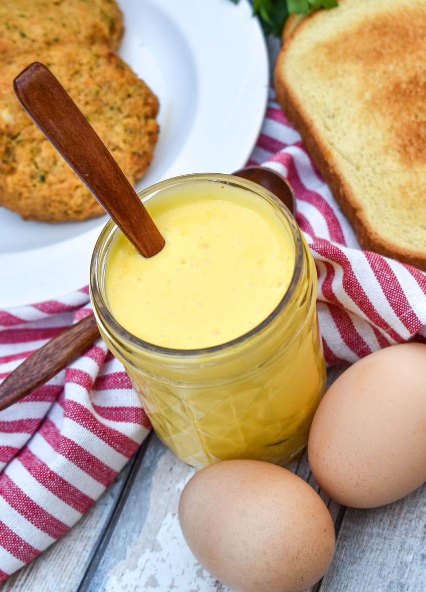 blender hollandaise sauce in a small glass mason jar