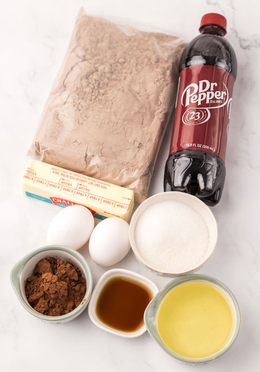 an overhead image showing the measured ingredients needed to make a batch of dr pepper brownies