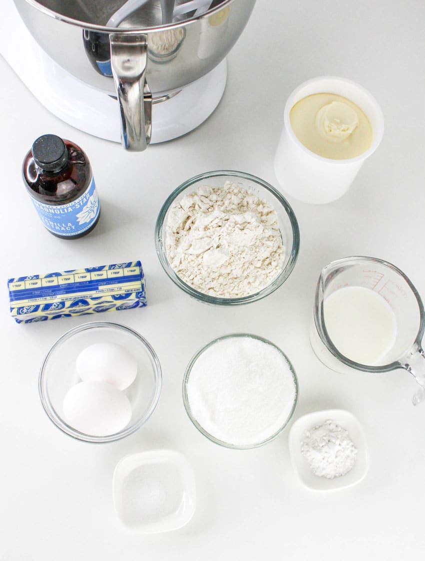 an overhead image showing the measured ingredients needed to make a cake in a jar