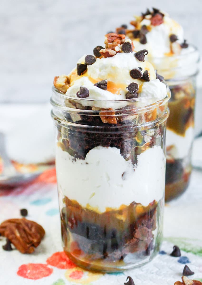 turtle brownie trifles in small glass jars
