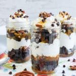 turtle brownie trifles in small glass jars