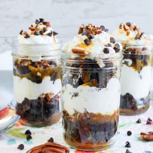turtle brownie trifles in small glass jars
