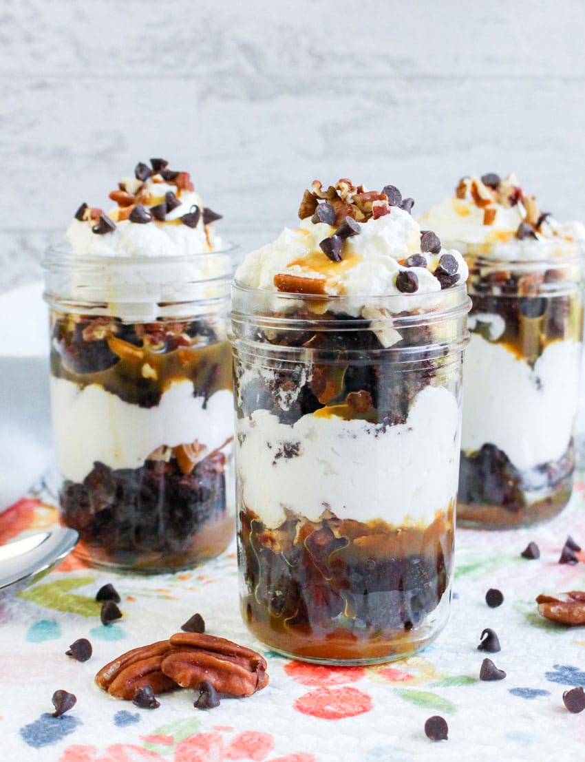 turtle brownie trifles in small glass jars