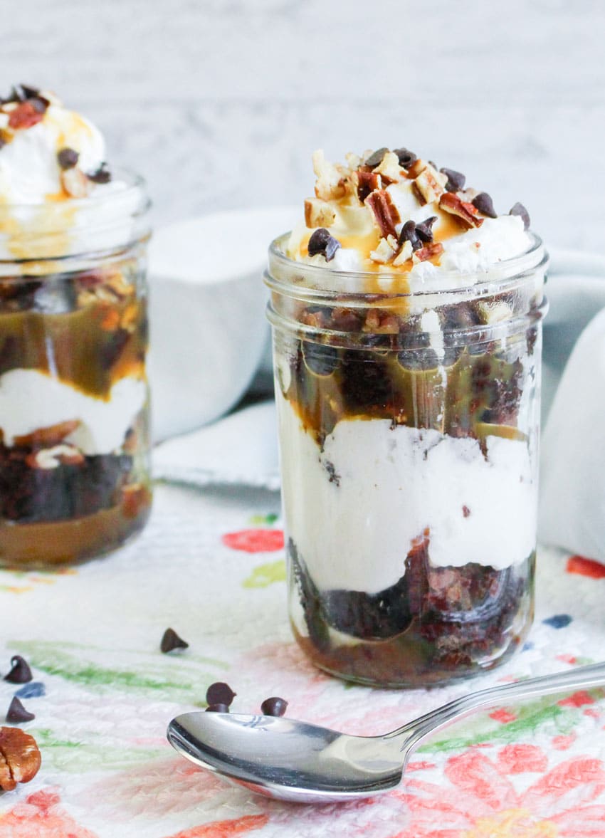 turtle brownie trifles in small glass jars
