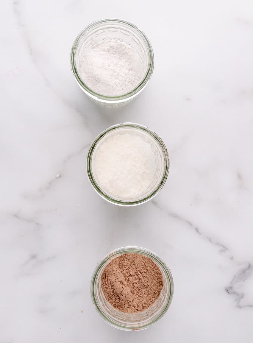 instant pudding mix in three small glass mason jars