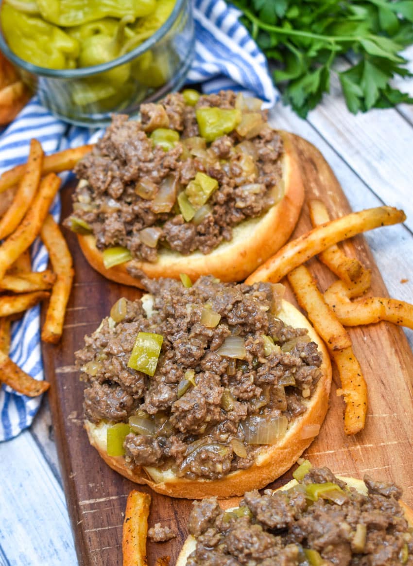 mississippi sloppy joe sandwiches on a wooden cutting board