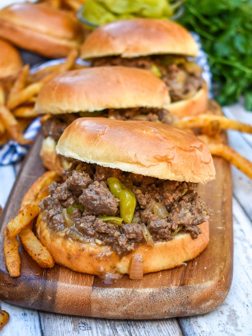 mississippi sloppy joe sandwiches on a wooden cutting board