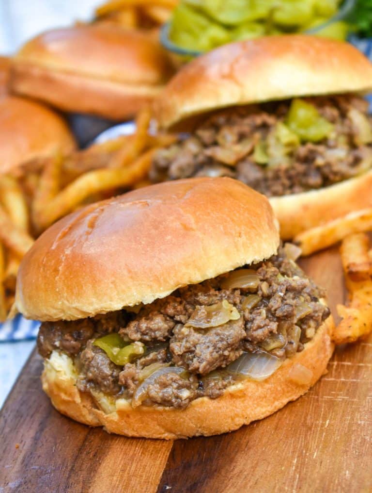 mississippi sloppy joe sandwiches on a wooden cutting board