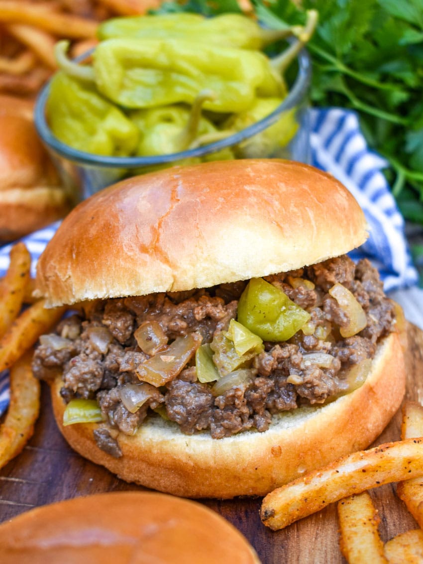 mississippi sloppy joe sandwiches on a wooden cutting board