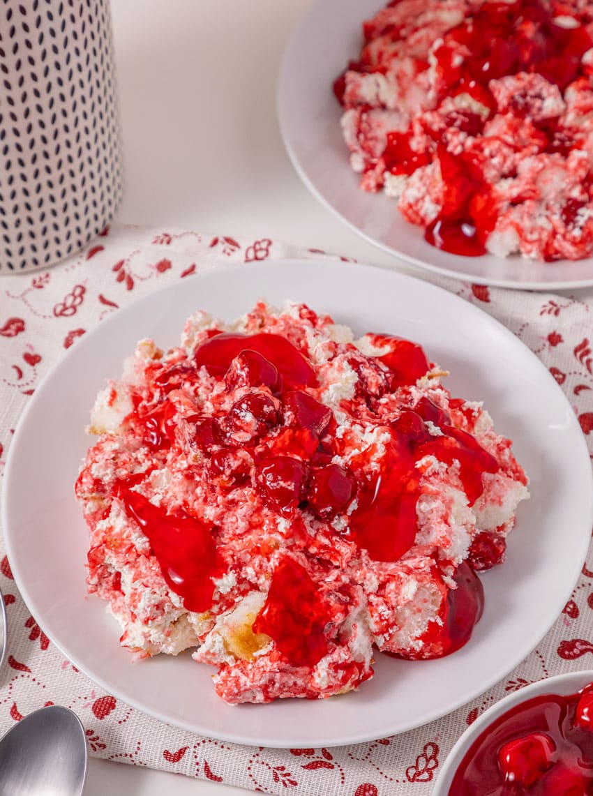 old fashioned cherries in the snow dessert in two shallow white bowls